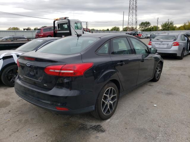Photo 4 from auction – 2018 FORD FOCUS SEL with VIN 1FADP3H2XJL233880