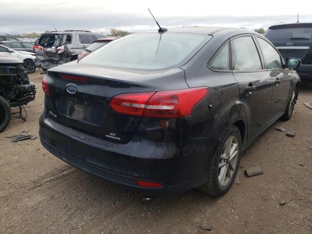 Photo 4 from auction – 2016 FORD FOCUS SE with VIN 1FADP3F24GL315373