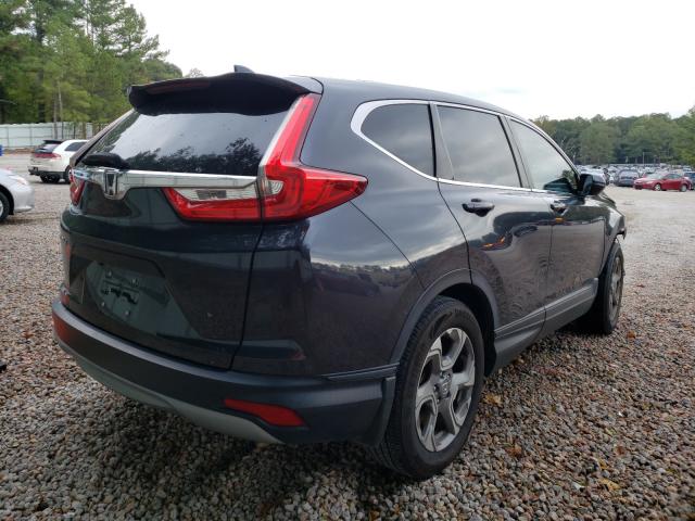 Photo 4 from auction – 2017 HONDA CR-V EXL with VIN 7FARW1H85HE029470