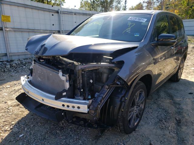 Photo 2 from auction – 2020 HONDA PASSPORT E with VIN 5FNYF8H55LB011274