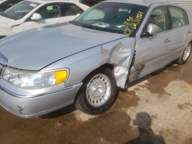 Photo 9 from auction – 1998 LINCOLN TOWN CAR E with VIN 1LNFM81W0WY693609