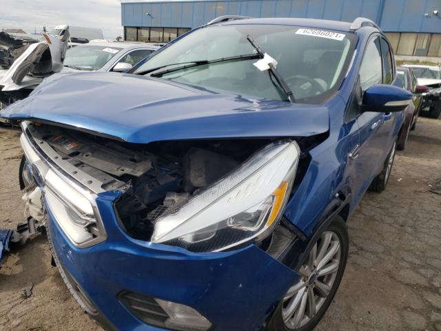 Photo 2 from auction – 2017 FORD ESCAPE TIT with VIN 1FMCU0JD7HUD65438
