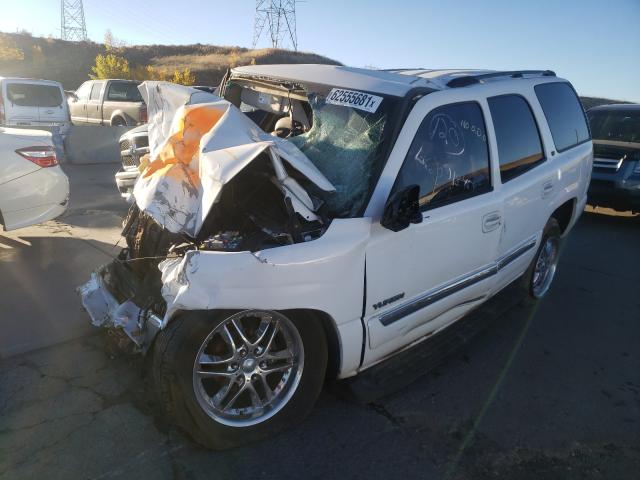 Photo 2 from auction – 2004 GMC YUKON with VIN 1GKEC13VX4R229883