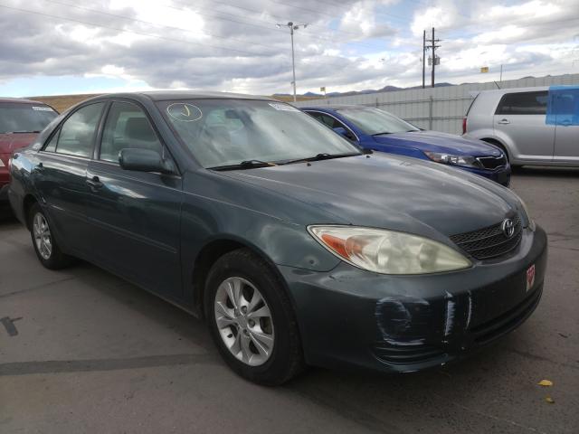TOYOTA CAMRY LE 2004 with VIN 4T1BF32K54U081823 - Photo from auction