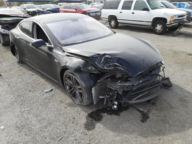 TESLA MODEL S 2014 with VIN 5YJSA1H1XEFP32444 - Photo from auction