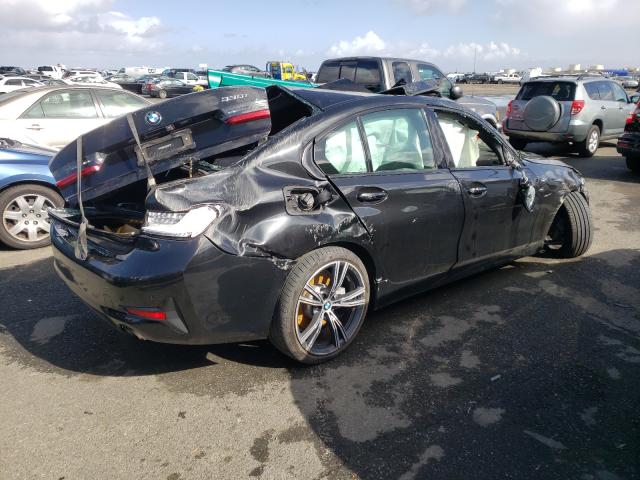 Photo 4 from auction – 2020 BMW 330I with VIN 3MW5R1J09L8B15056