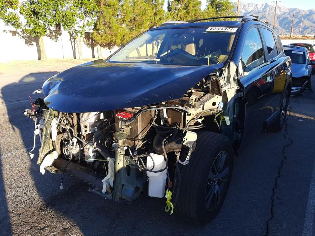 Photo 2 from auction – 2017 TOYOTA RAV4 XLE with VIN JTMWFREV0HD101030
