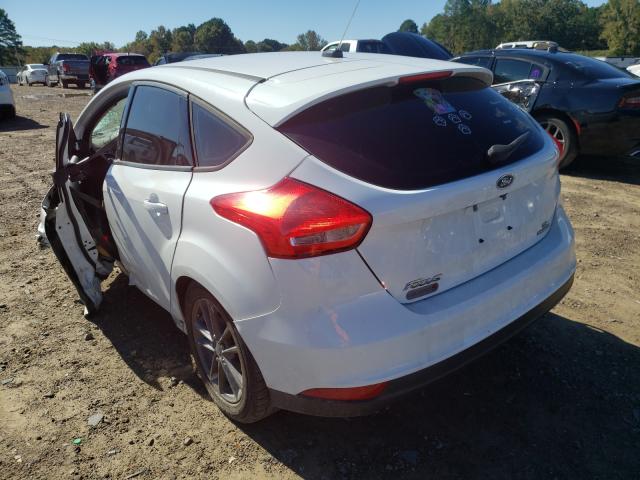 Photo 3 from auction – 2015 FORD FOCUS SE with VIN 1FADP3K21FL282126