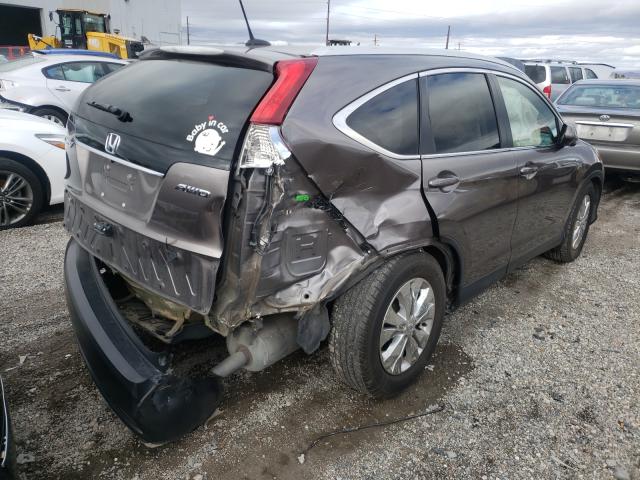 Photo 4 from auction – 2014 HONDA CR-V EXL with VIN 5J6RM4H75EL096549
