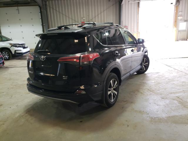Photo 4 from auction – 2018 TOYOTA RAV4 ADVEN with VIN 2T3RFREV4JW856297