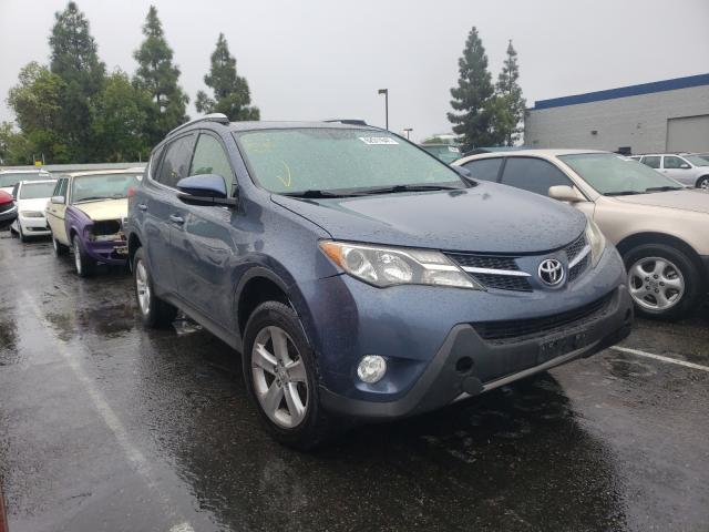 TOYOTA RAV4 XLE 2014 with VIN JTMWFREV2ED037889 - Photo from auction