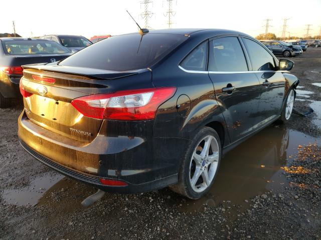 Photo 4 from auction – 2013 FORD FOCUS with VIN 1FADP3J2XDL245395