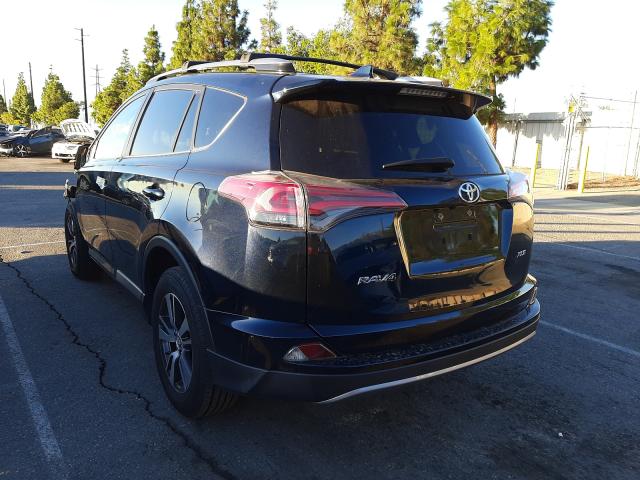 Photo 3 from auction – 2017 TOYOTA RAV4 XLE with VIN JTMWFREV0HD101030