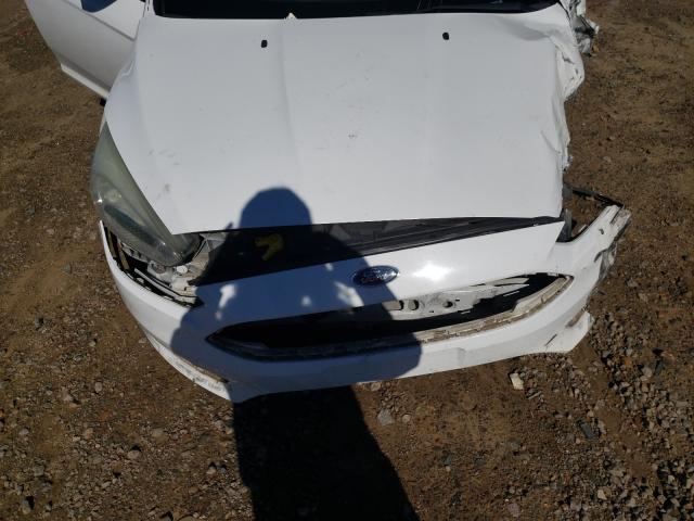 Photo 7 from auction – 2015 FORD FOCUS SE with VIN 1FADP3K21FL282126