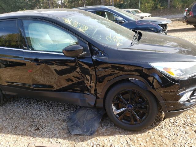 Photo 9 from auction – 2017 FORD ESCAPE SE with VIN 1FMCU9GD2HUD20175