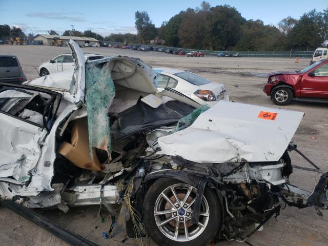 Photo 9 from auction – 2016 FORD FOCUS SE with VIN 1FADP3K23GL239344