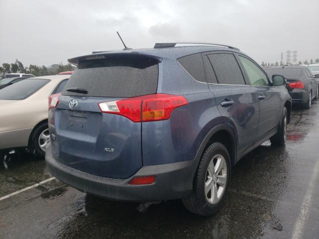 Photo 4 from auction – 2014 TOYOTA RAV4 XLE with VIN JTMWFREV2ED037889