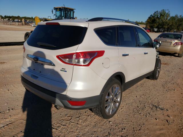 Photo 4 from auction – 2014 FORD ESCAPE SE with VIN 1FMCU9GX9EUD63885