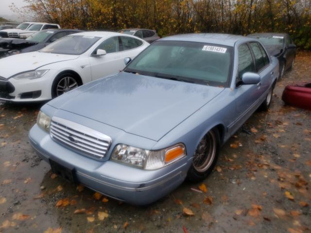 Photo 2 from auction – 2000 FORD CROWN VICT with VIN 2FAFP74W8YX130477