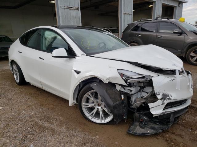 TESLA MODEL Y 2021 with VIN 5YJYGDEE4MF069517 - Photo from auction