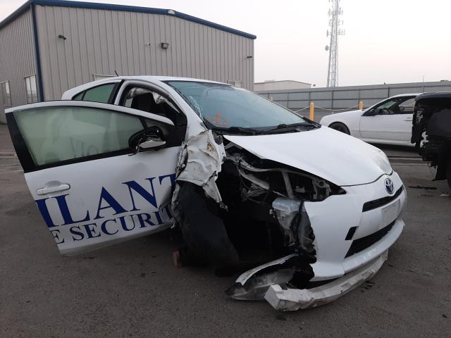 TOYOTA PRIUS C 2014 with VIN JTDKDTB39E1575057 - Photo from auction