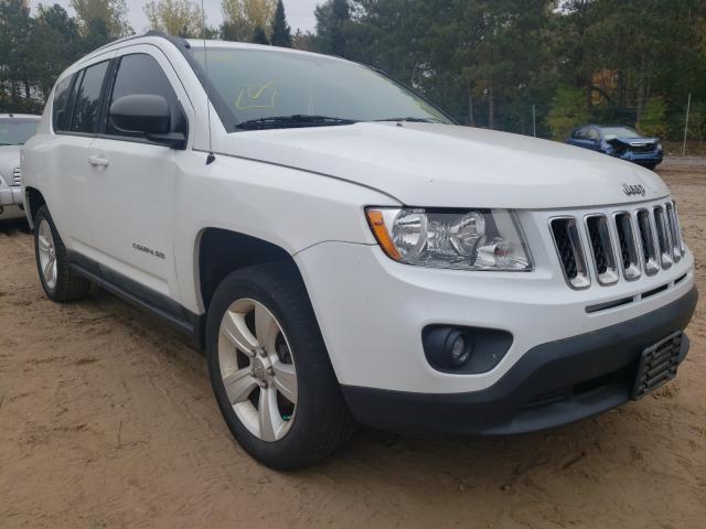 JEEP COMPASS 2011 with VIN 1J4NT1FAXBD260852 - Photo from auction