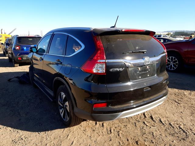 Photo 3 from auction – 2016 HONDA CR-V TOURI with VIN 5J6RM3H99GL015275