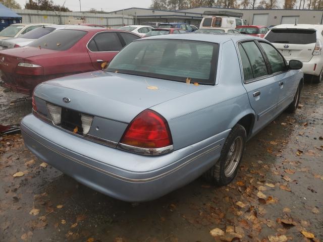 Photo 4 from auction – 2000 FORD CROWN VICT with VIN 2FAFP74W8YX130477