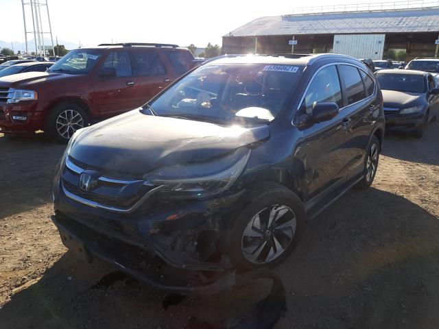 Photo 2 from auction – 2016 HONDA CR-V TOURI with VIN 5J6RM3H99GL015275
