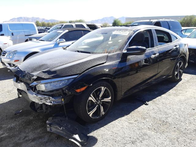 Photo 2 from auction – 2016 HONDA CIVIC TOUR with VIN 2HGFC1F91GH647074