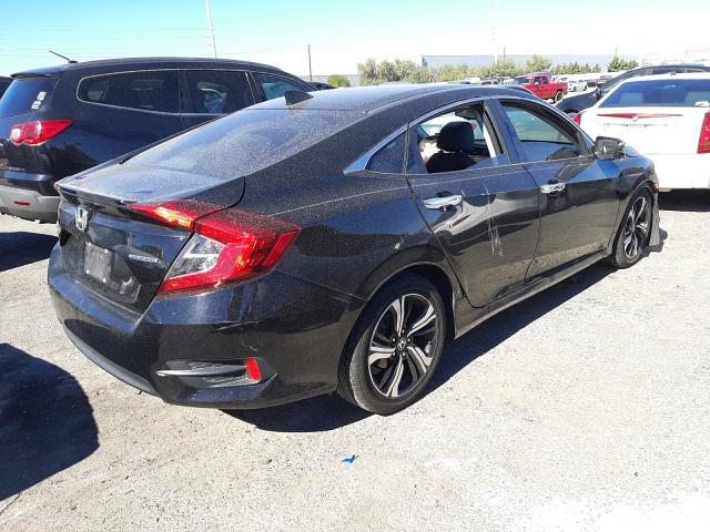 Photo 4 from auction – 2016 HONDA CIVIC TOUR with VIN 2HGFC1F91GH647074