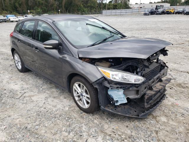 FORD FOCUS SE 2016 with VIN 1FADP3K2XGL215381 - Photo from auction