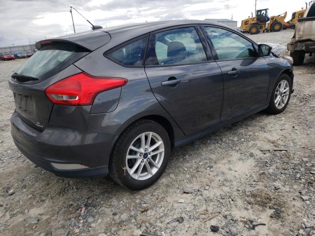 Photo 4 from auction – 2016 FORD FOCUS SE with VIN 1FADP3K2XGL215381