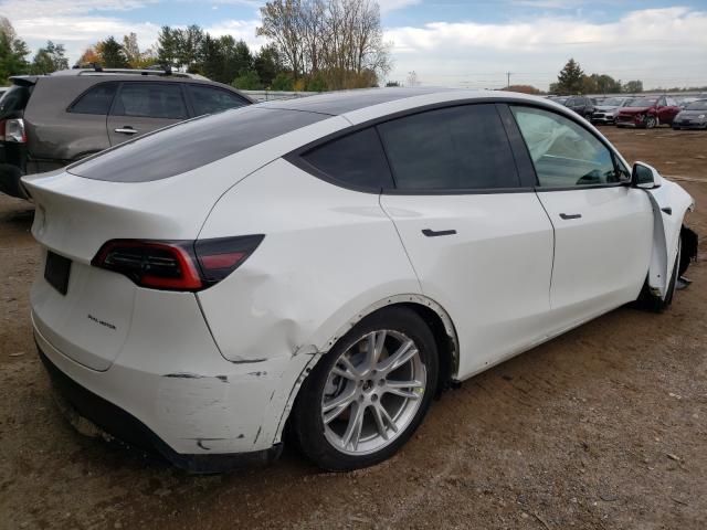 Photo 4 from auction – 2021 TESLA MODEL Y with VIN 5YJYGDEE4MF069517