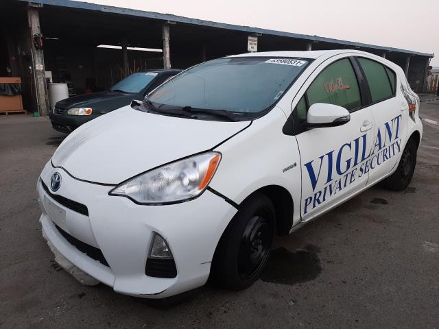 Photo 2 from auction – 2014 TOYOTA PRIUS C with VIN JTDKDTB39E1575057