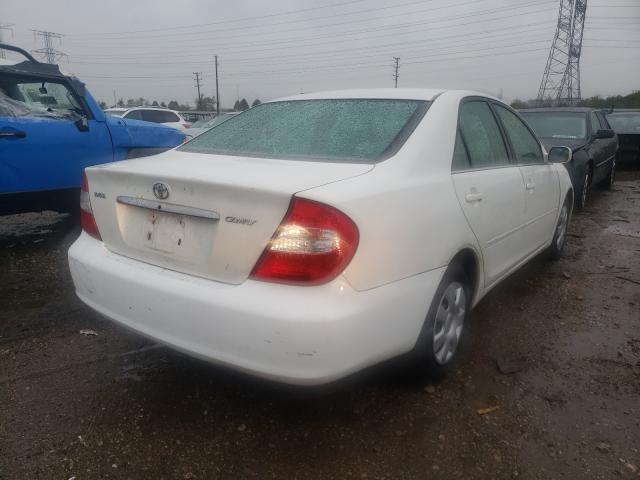 Photo 4 from auction – 2002 TOYOTA CAMRY LE with VIN 4T1BE32KX2U064581