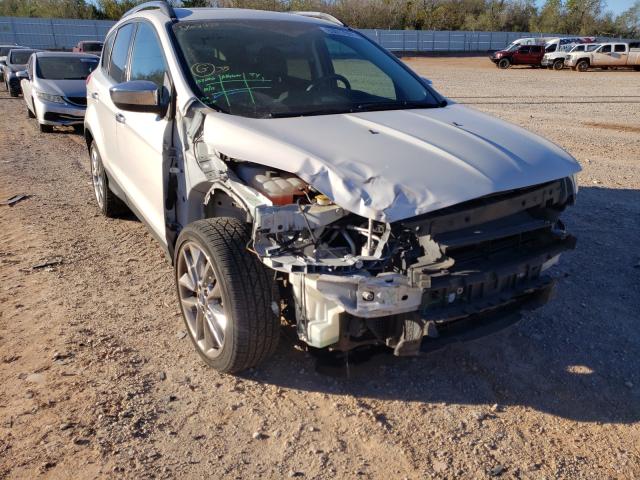 FORD ESCAPE SE 2014 with VIN 1FMCU9GX9EUD63885 - Photo from auction