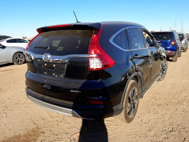 Photo 4 from auction – 2016 HONDA CR-V TOURI with VIN 5J6RM3H99GL015275