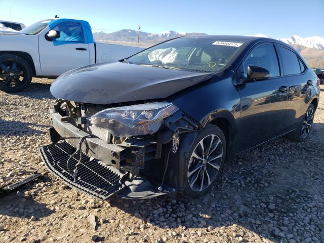 Photo 2 from auction – 2019 TOYOTA COROLLA L with VIN 5YFBURHE0KP877937