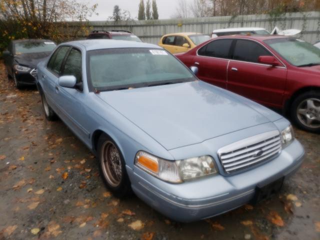 FORD CROWN VICT 2000 with VIN 2FAFP74W8YX130477 - Photo from auction
