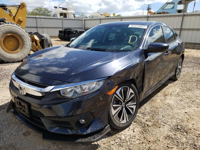 Photo 2 from auction – 2017 HONDA CIVIC EX with VIN 2HGFC1F35HH654459