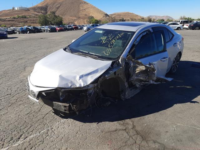 Photo 2 from auction – 2017 TOYOTA COROLLA L with VIN 5YFBURHE1HP671373