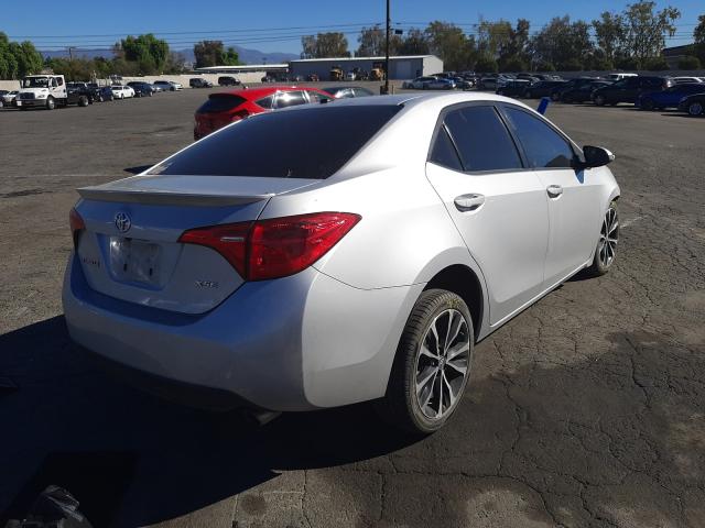 Photo 4 from auction – 2017 TOYOTA COROLLA L with VIN 5YFBURHE1HP671373