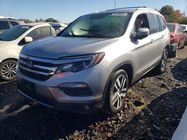 Photo 2 from auction – 2016 HONDA PILOT TOUR with VIN 5FNYF6H94GB113615