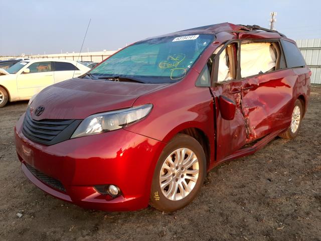 Photo 2 from auction – 2014 TOYOTA SIENNA XLE with VIN 5TDYK3DC2ES474989