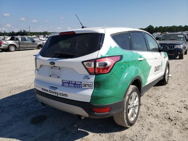 Photo 4 from auction – 2017 FORD ESCAPE SE with VIN 1FMCU9GD3HUC39010