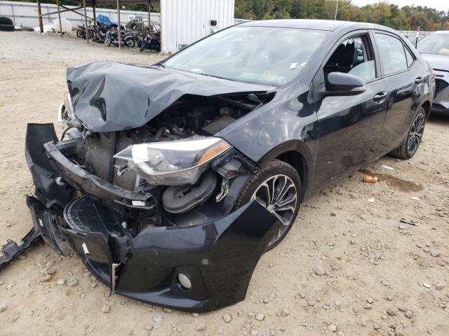 Photo 2 from auction – 2014 TOYOTA COROLLA L with VIN 2T1BURHEXEC050211