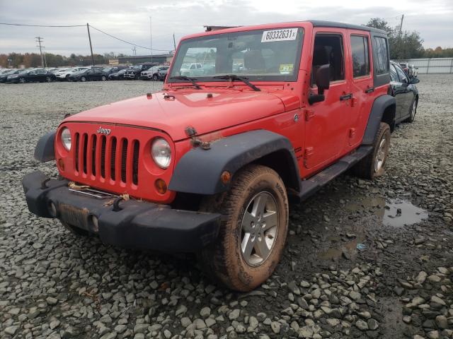 Photo 2 from auction – 2013 JEEP WRANGLER U with VIN 1C4BJWDG3DL642894
