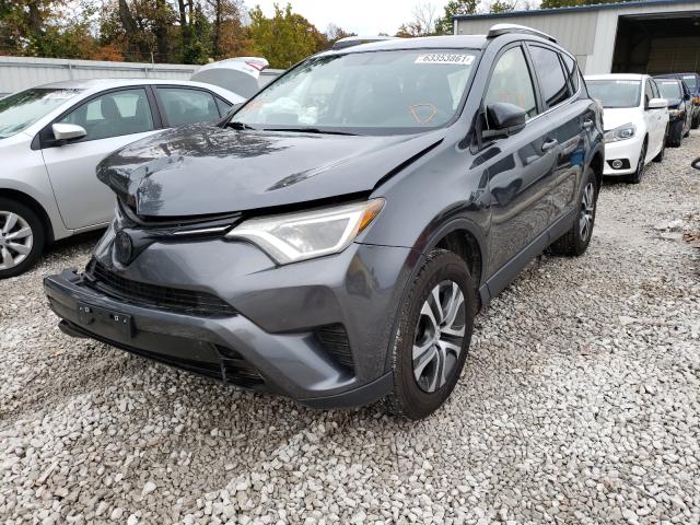 Photo 2 from auction – 2016 TOYOTA RAV4 LE with VIN JTMZFREV5GD085077