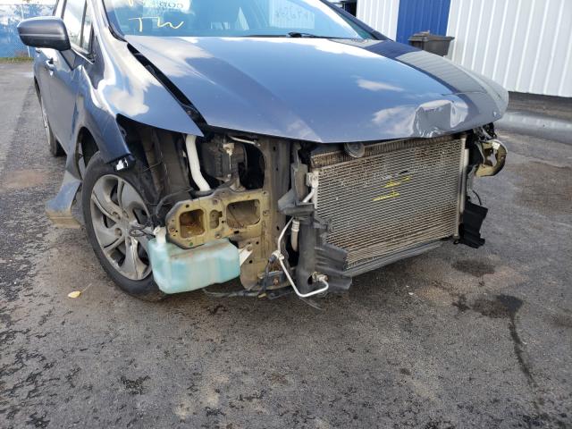 Photo 9 from auction – 2015 HONDA CIVIC LX with VIN 2HGFB2F4XFH003360